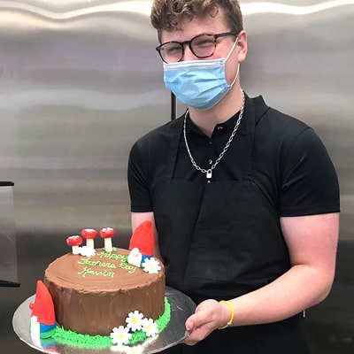 Will Jones '26 with one of his custom birthday cakes.