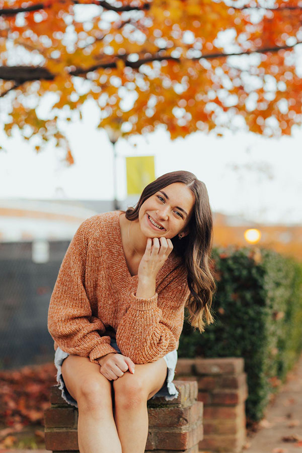 photo of Jessica Ralph posing under a tree