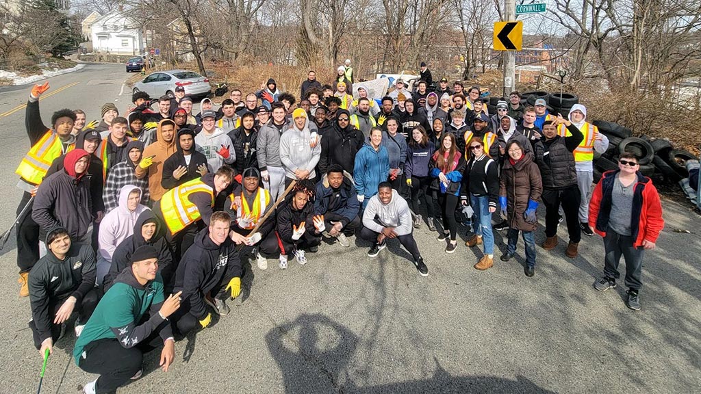 a group of volunteers at a Cozy Rhody litter cleanup in Providence in March 2022