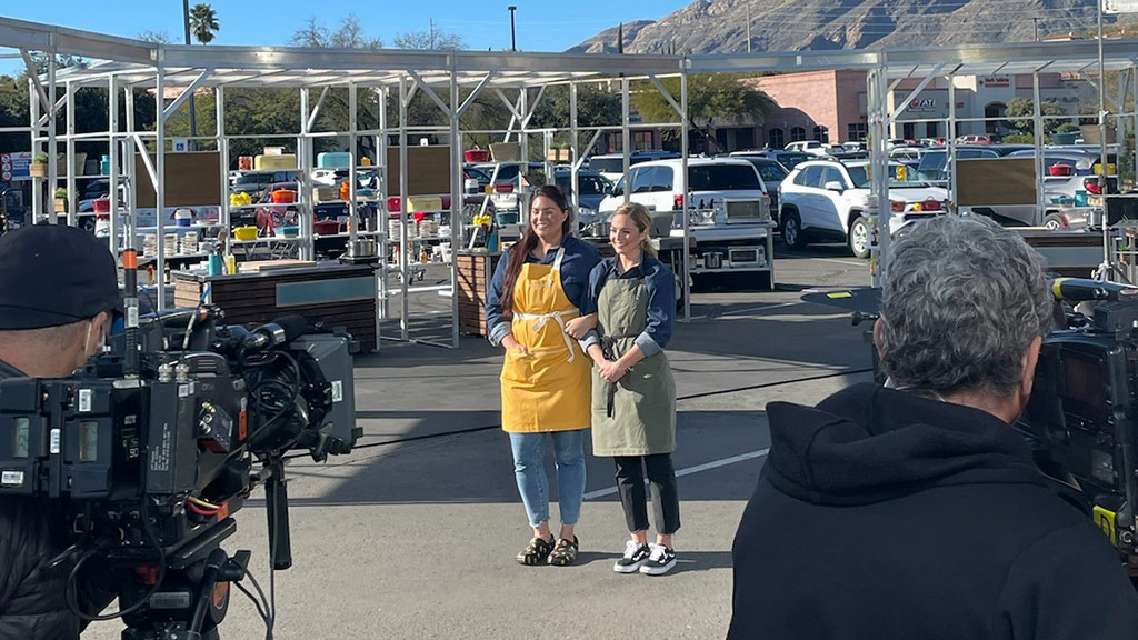 TV cameras pointed toward Emily Sullivan '19 and another contestant on Supermarket Stakeout.