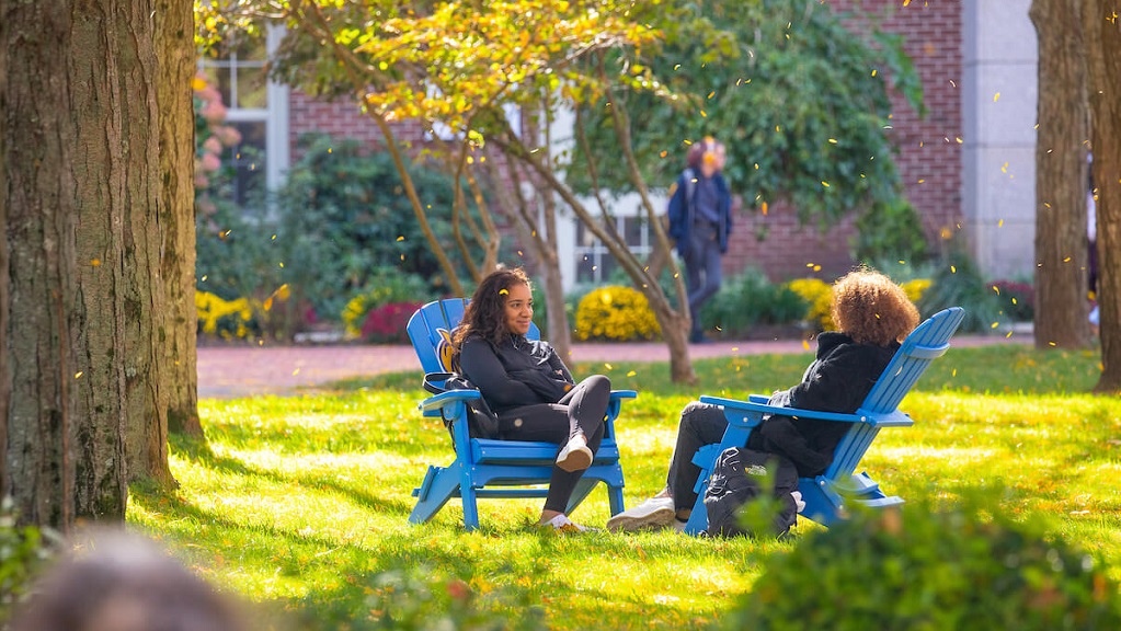 students chatting at gaebe commons