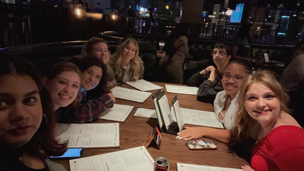 JWU NSO students pause for a photo while dining in a restaurant on a trip to Georgia