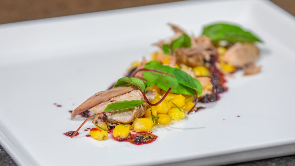 Duck with chokecherry sauce and nixtamalized corn at the Sean Sherman demo.