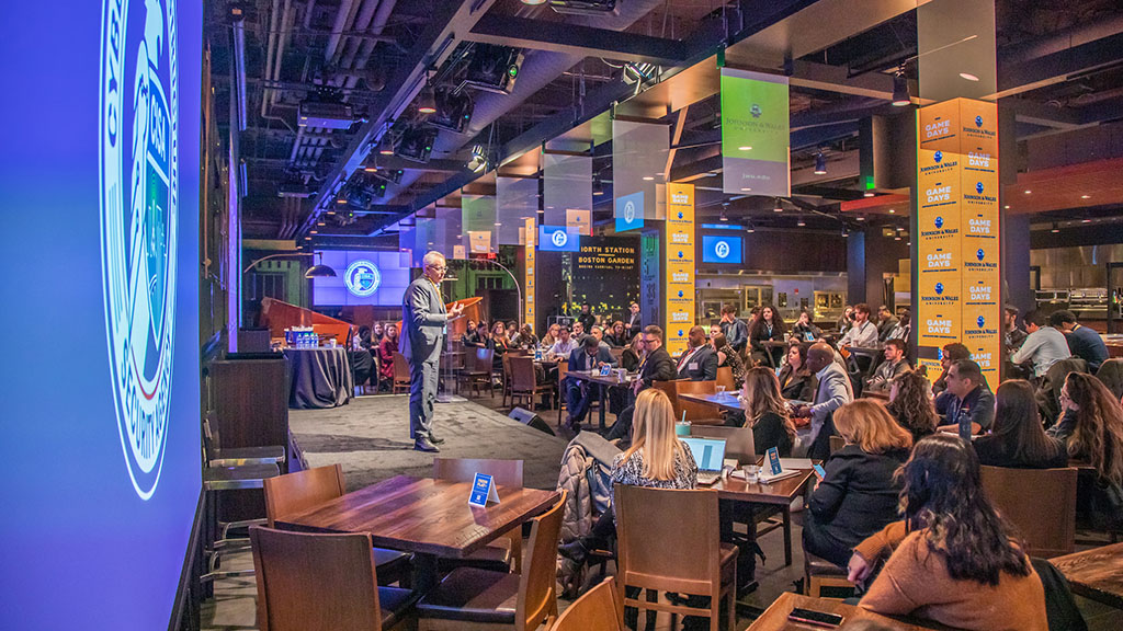 The crowd sitting at the seminar in the Legends restaurant in TD Garden