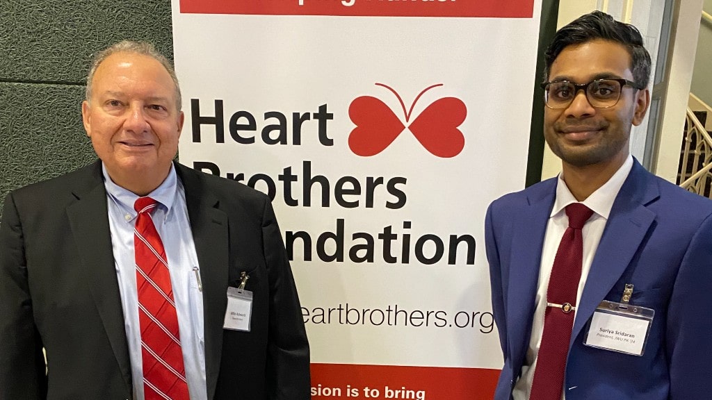 Mike Ashworth (left) and JWU PA student Suriya Sridaran ’24 at the April 28 Heart Brothers Foundation fundraiser. 