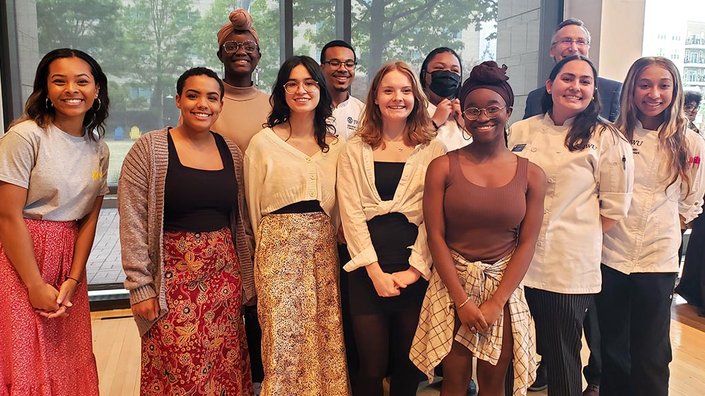 all of the Student Research, Design & Innovation Symposium award winners at the Charlotte Campus pose for a quick photo