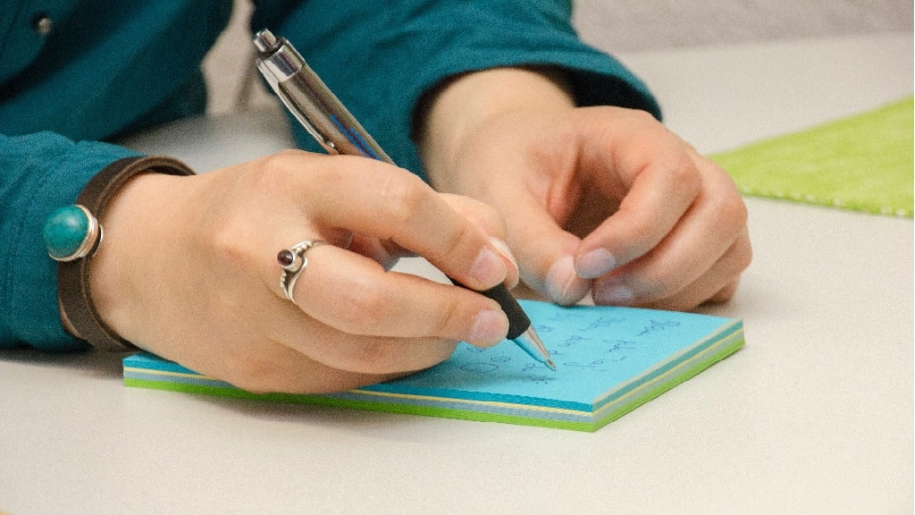 a girl taking notes