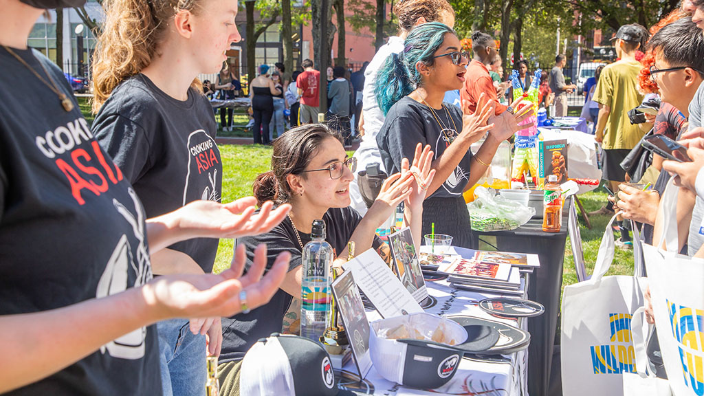 Students talking at a table