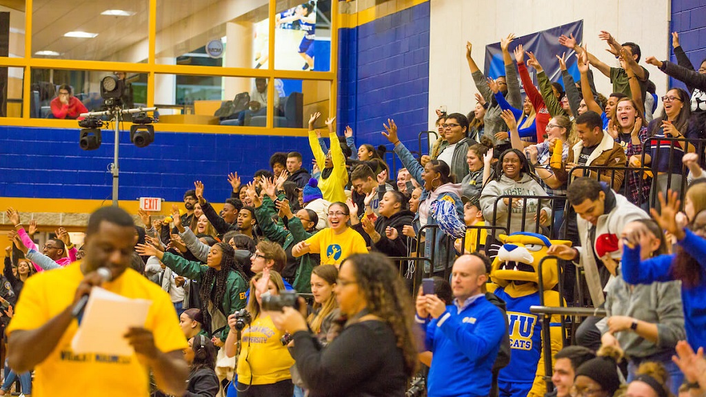 JWU students cheering in auditorium
