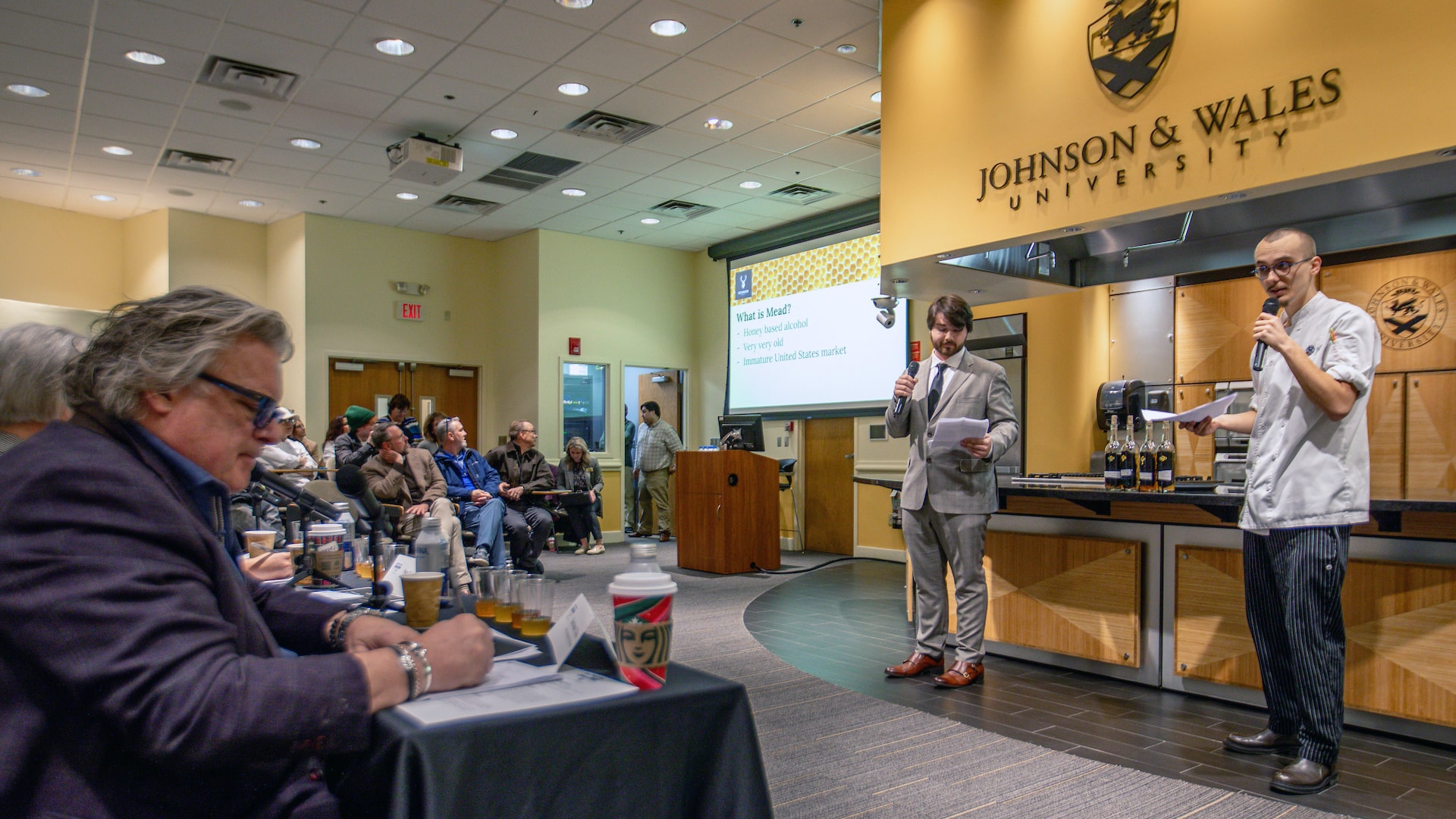 Max Stanger (left) and Kyle Andrew (right) present their mead concept to the judges.