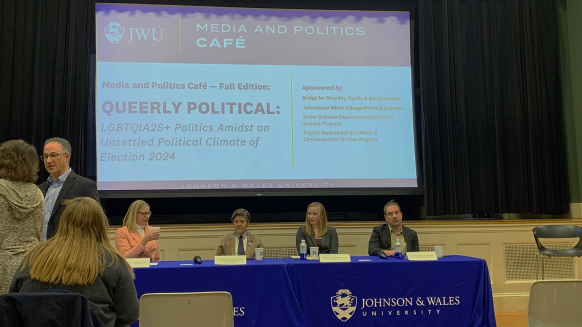 Queerly Political panel with panelists sitting at table