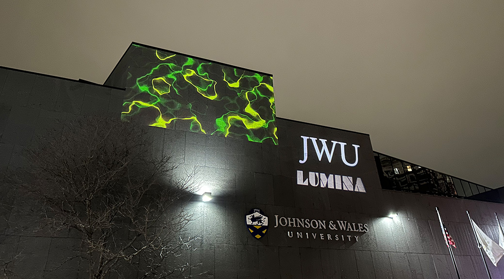 Projection of local art on JWU's Yena Center.