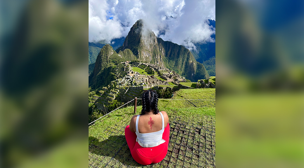 Student sitting on mountains