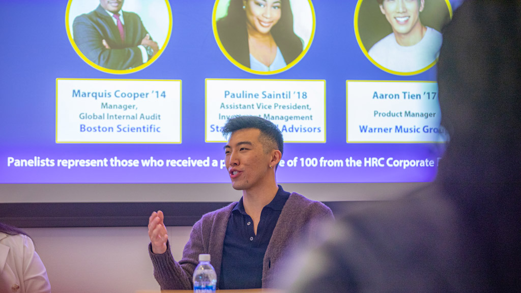 action shot of Aaron Tien '17 speaking on the DEIB alumni panel