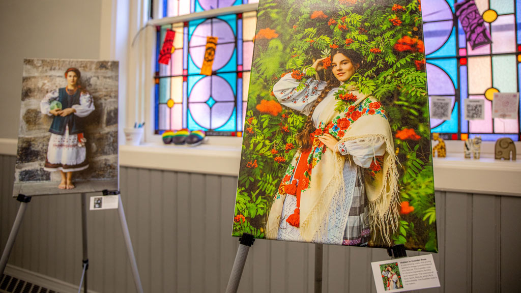 a closeup photo depicts exhibited photography by Ksenia Lesnaya