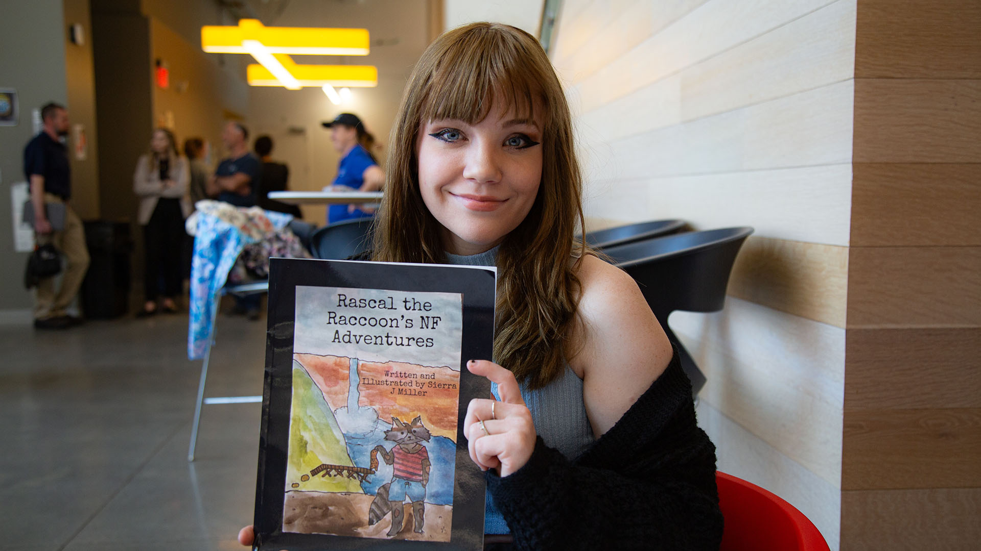 A woman holding a book