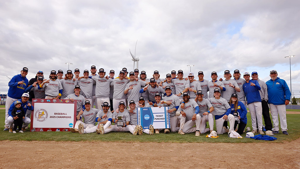 photo of the JWU Providence men's baseball team after winning GNAC in 2025