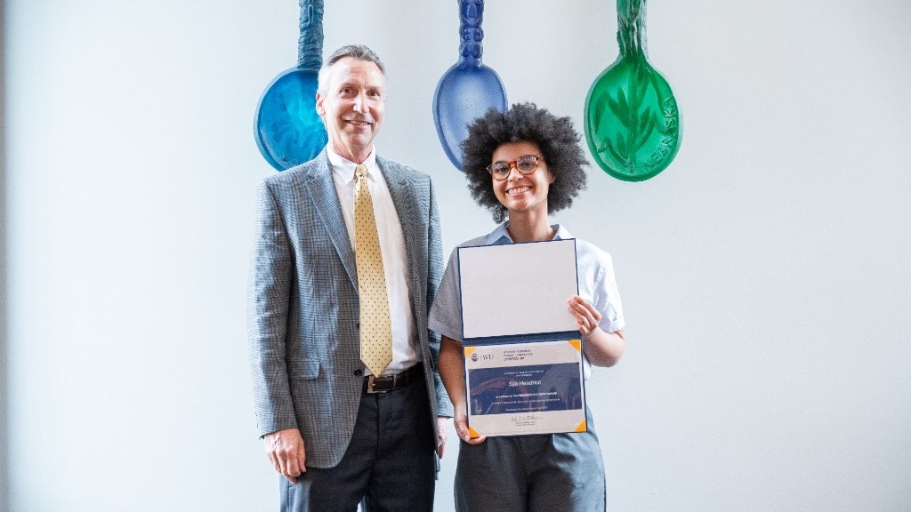 Charlotte Campus President Richard Mathieu, Ph.D. and Sija Headrick ’25.  