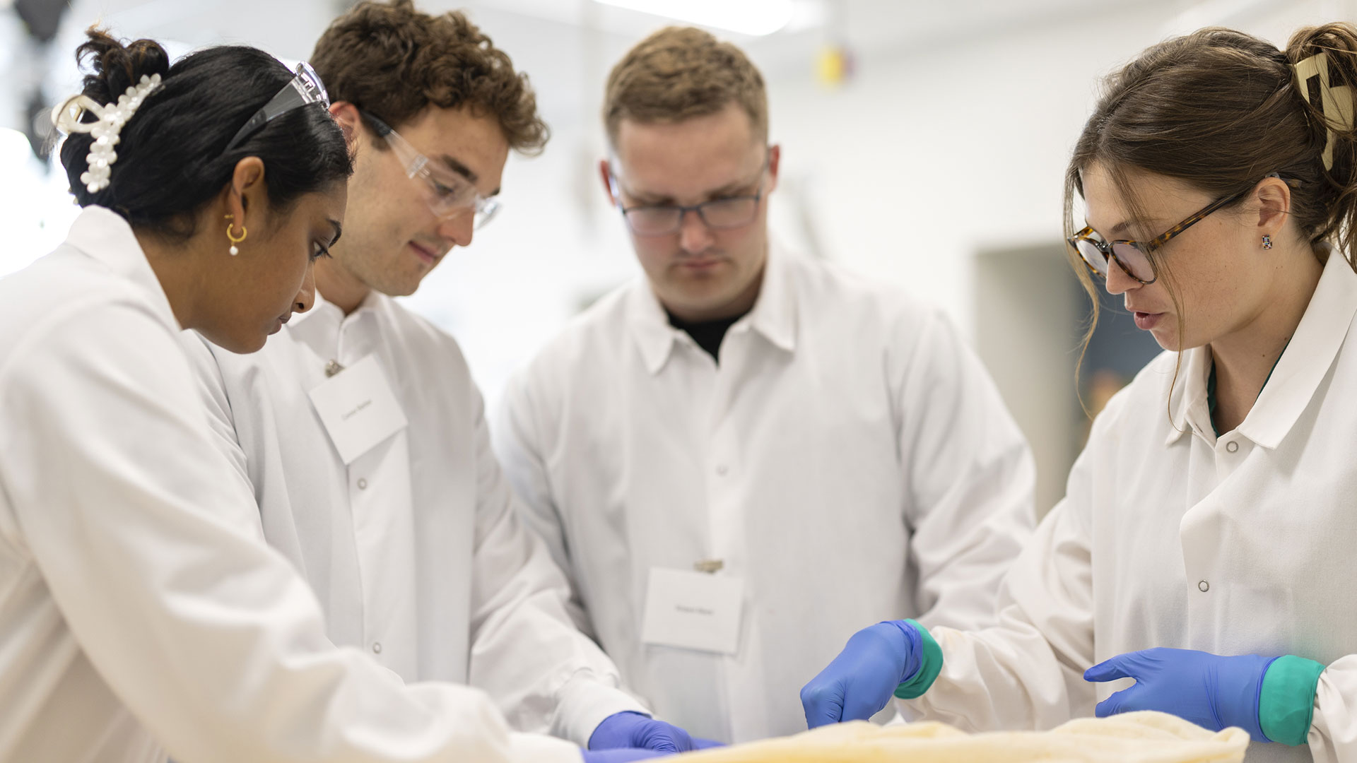 Students gaining hands-on experience in a JWU lab 