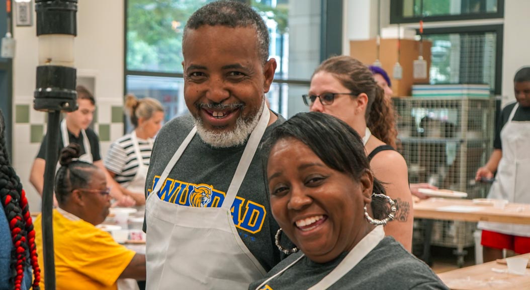 Dad and mom smiling at camera