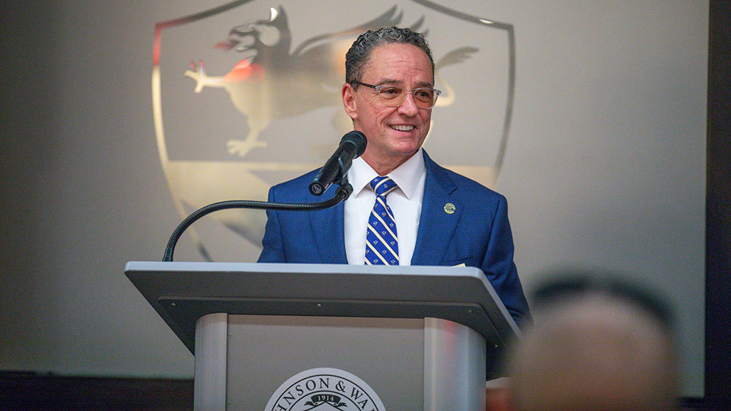 JWU Providence President Joseph Greene speaking at a podium