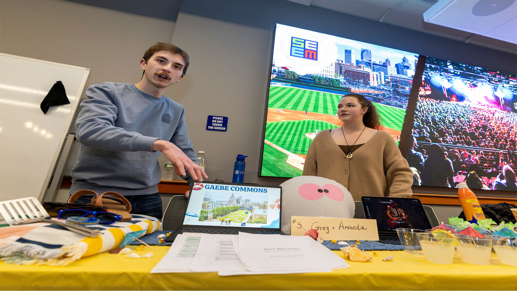Event Management Students Pitching a Venue