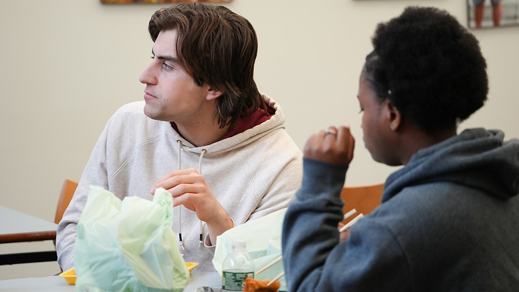 photo showing Kostas Henley '28 and Jennifer Kroma '26 lunching at Tufts University