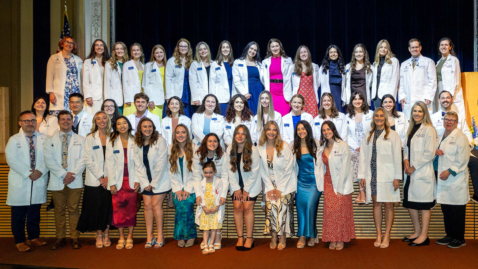 group photo of the JWU Physician Assistant Studies cohort and their faculty