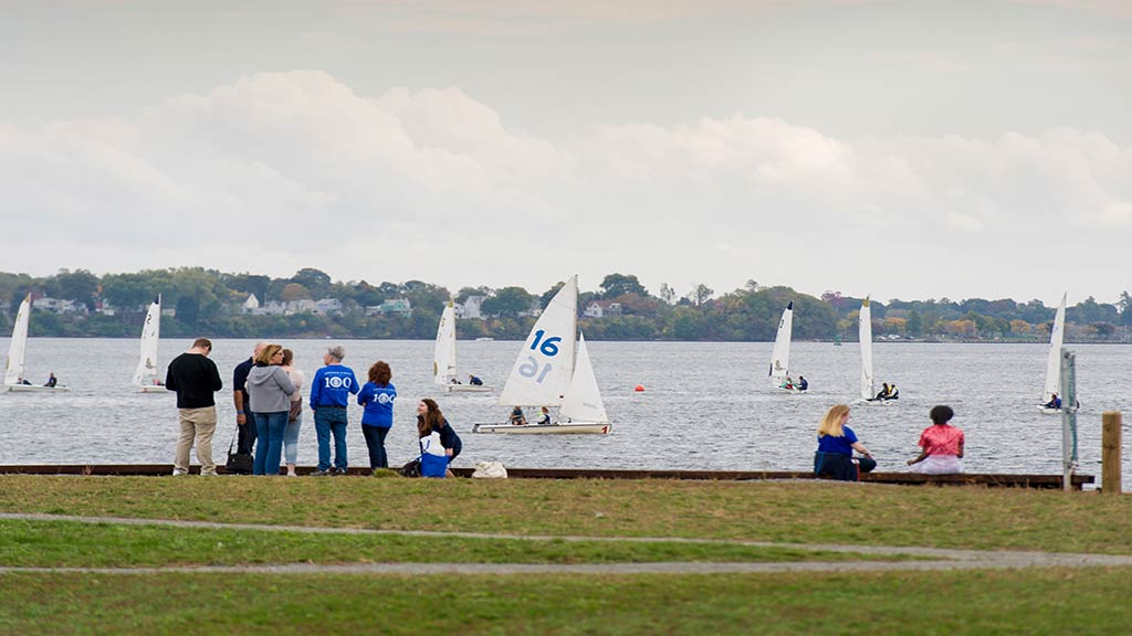 Photo of people along ocean