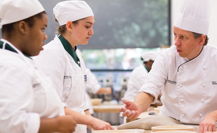 Chef Harry Peeomoeeler teaching a class in Charlotte.