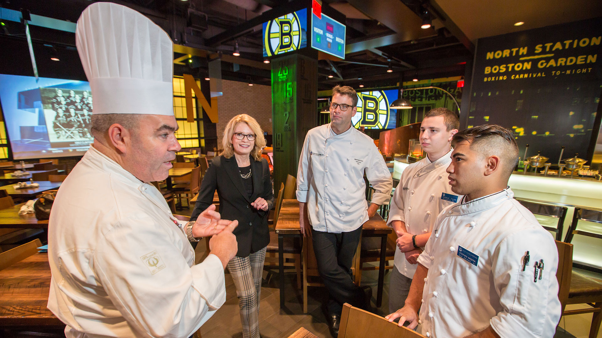 Chef Kevin Doherty, Regional Executive Chef - Delaware North Sportservice/TD Garden; Chancellor Runey; Matthew Britt, BPS, instructor, College of Culinary Arts; Jordan Fried ’20 (culinary arts major); Stephen Nadera ’20 (culinary arts major)