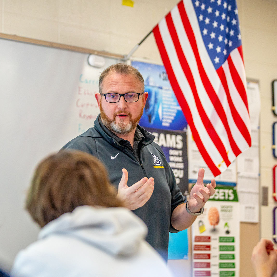 Greg Hogan teaching in a classroom.