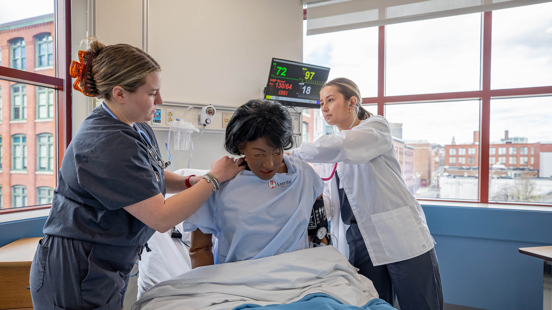 ABSN students practice hands-on nursing in on site simulatin center