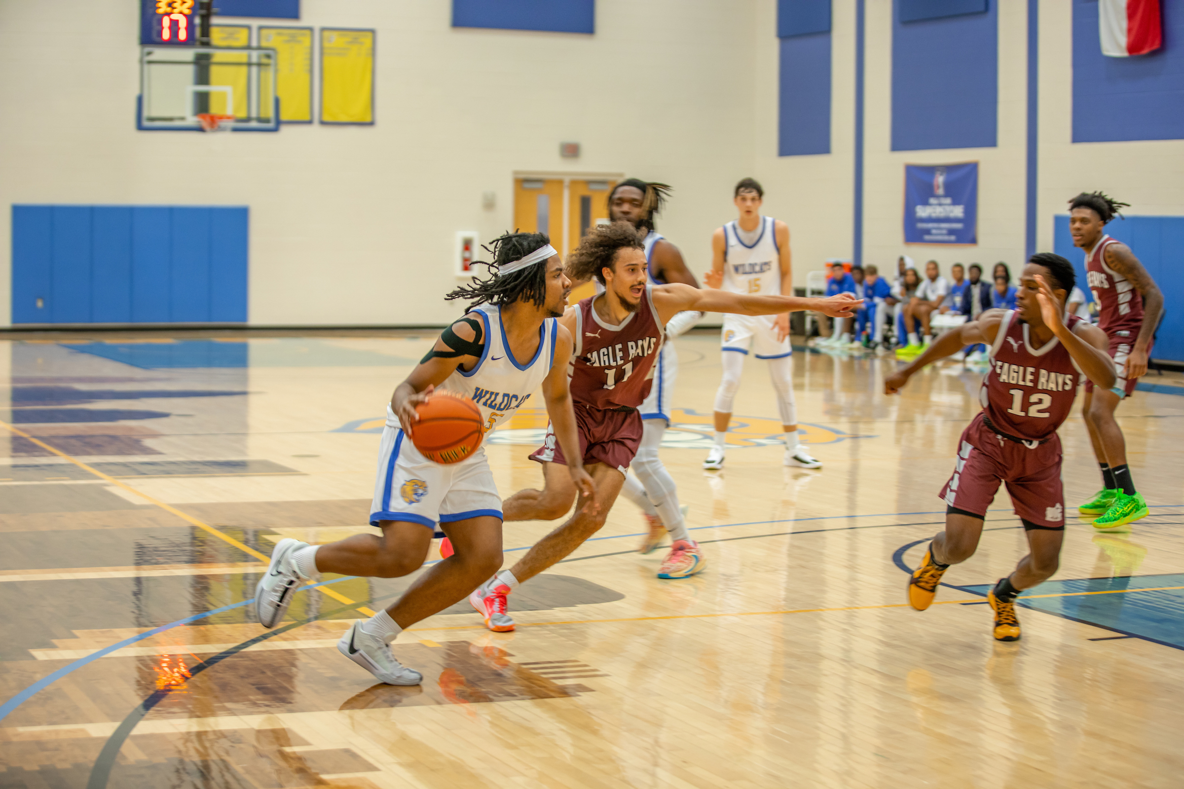 JWU Charlotte student-athletes compete on the basketball court