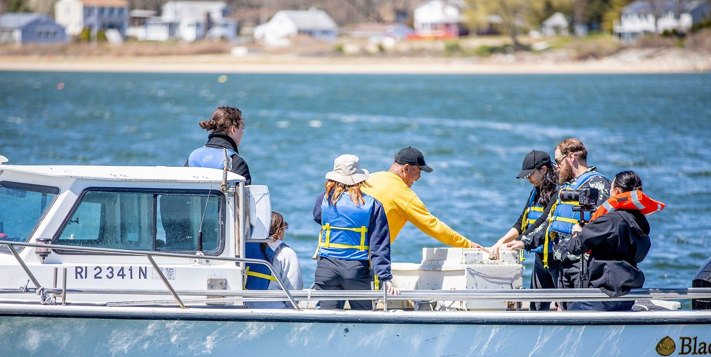Students on a boat in Narragansett bay.