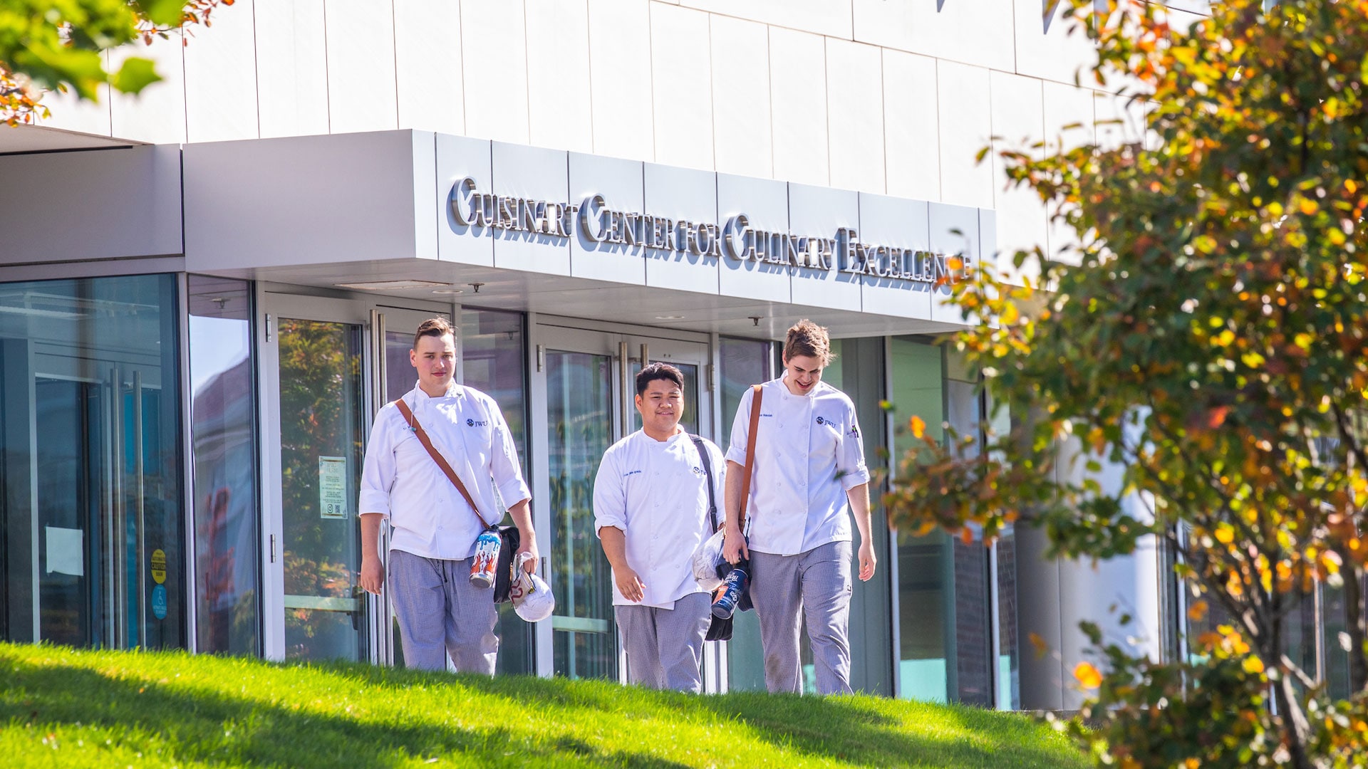 students walking in front of culinary building