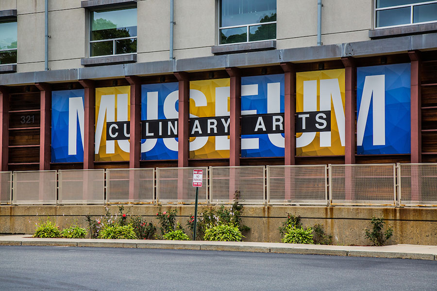 The sign for the Culinary Arts Museum displayed outside the Friedman Center building.