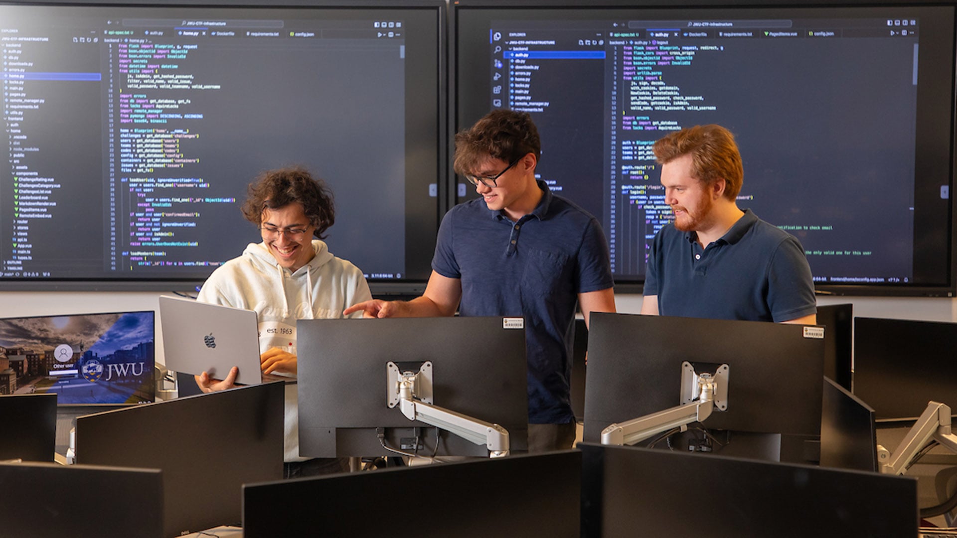 Jordan Limor ’24, Andrew Bugera ’24 and Christopher Lorme ’24 during the design phase of their Cyberpaw capture-the-flag game.