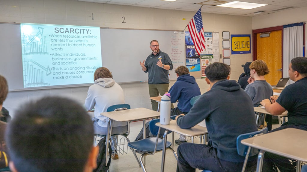 MAT alum Greg Horgan teaches high school business classes.