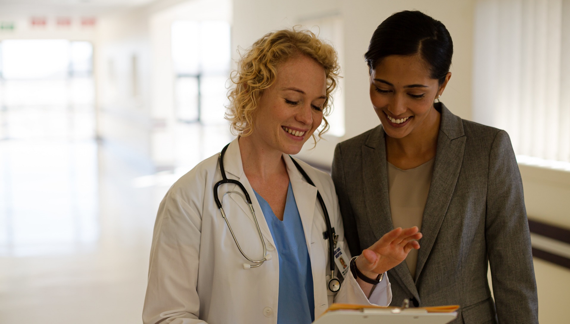two medical professionals having a discussion