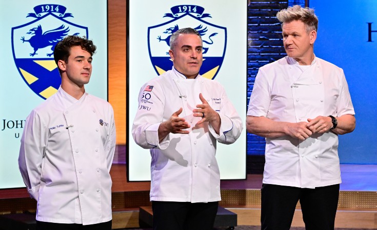 Three men in chef coats stand together; one is Gordon Ramsay