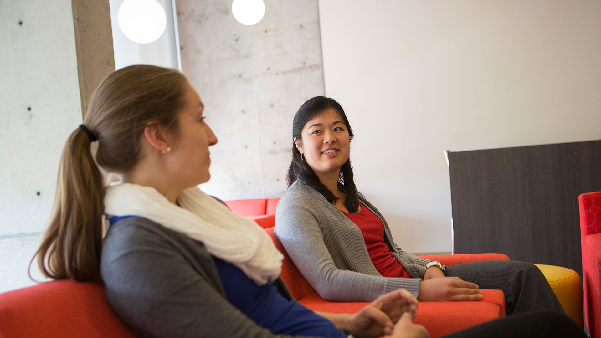 Psychology students chatting in student lounge