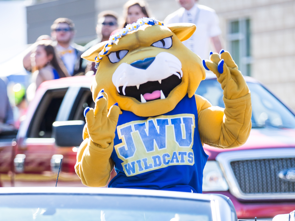 JWU mascot among cars during welcome week.