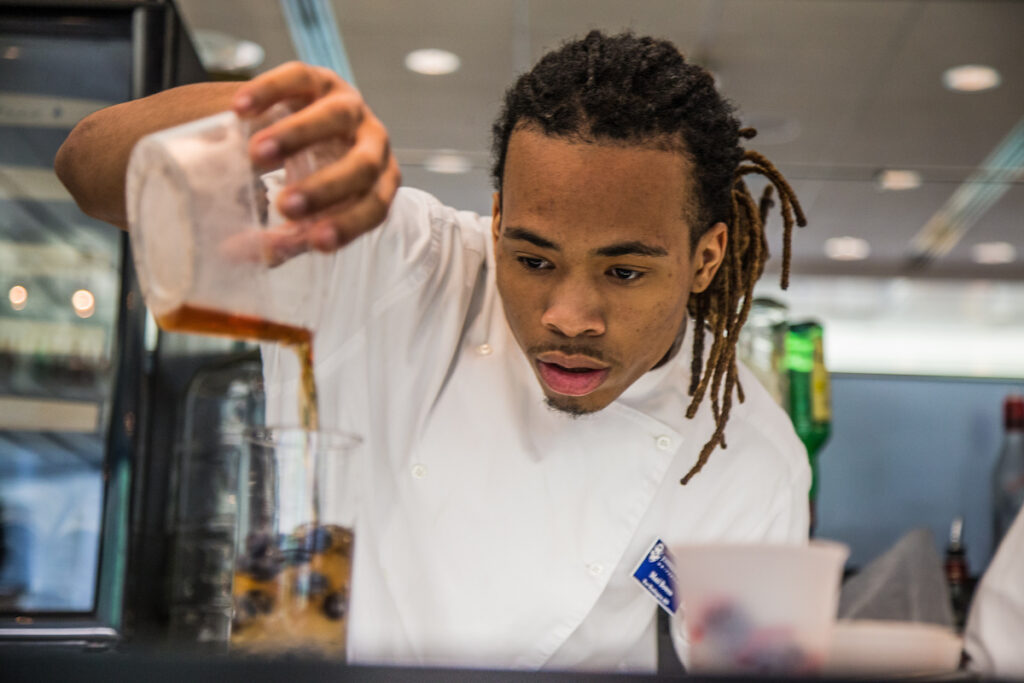 Male CFIT student in beverage lab