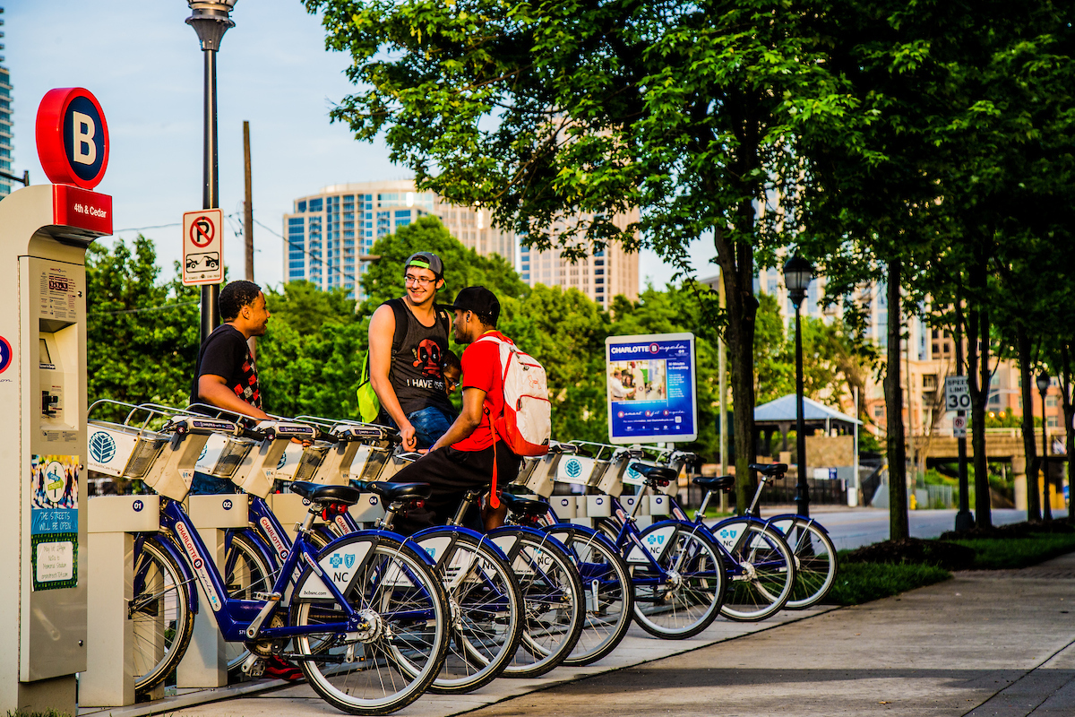 Students near bikes near downtown Charlotte