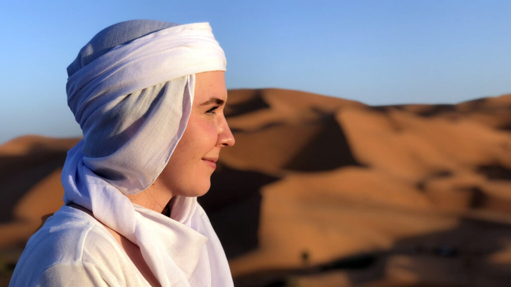 A person looking out into the desert.