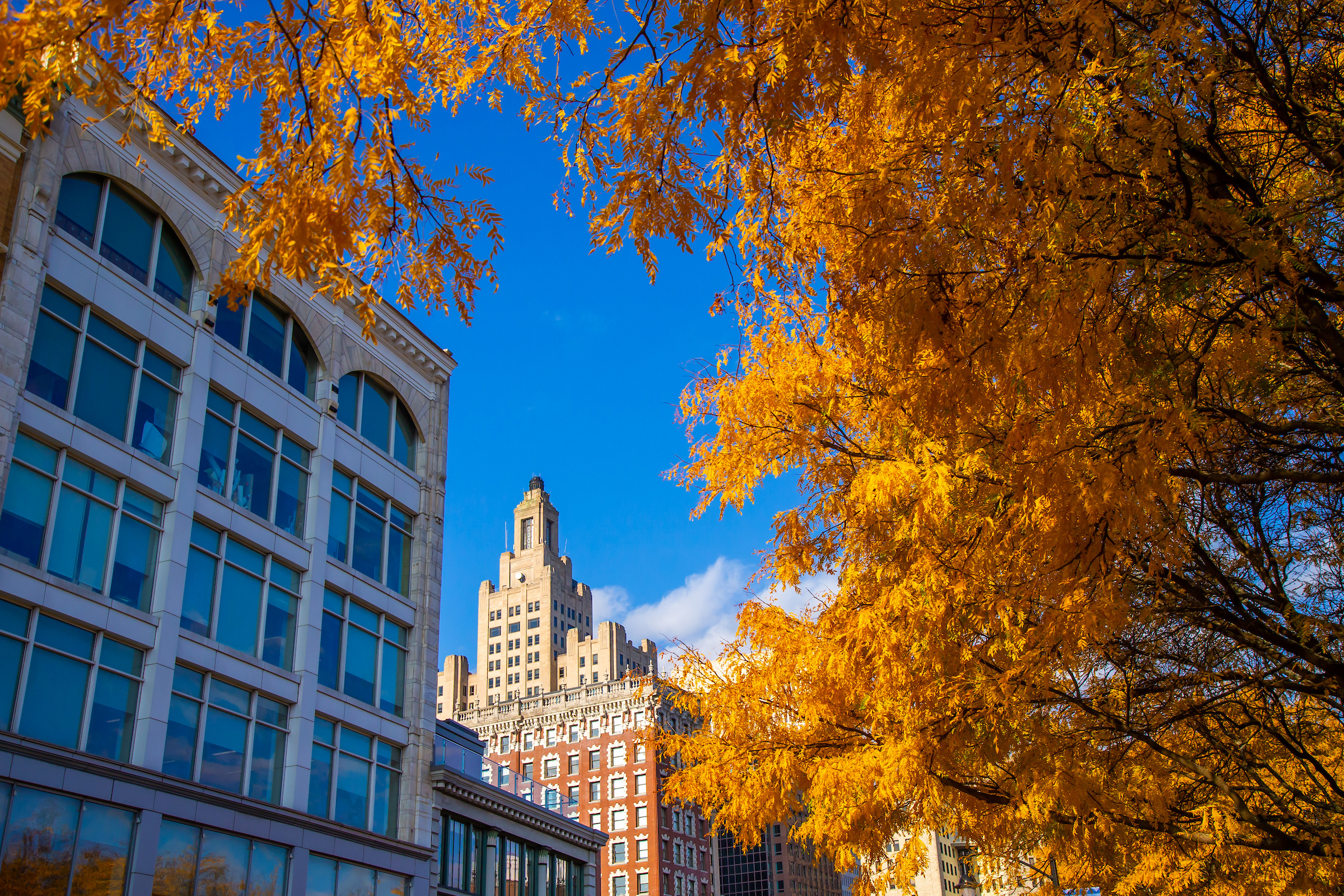 Gaebe Commons in the Fall with Provience skyline