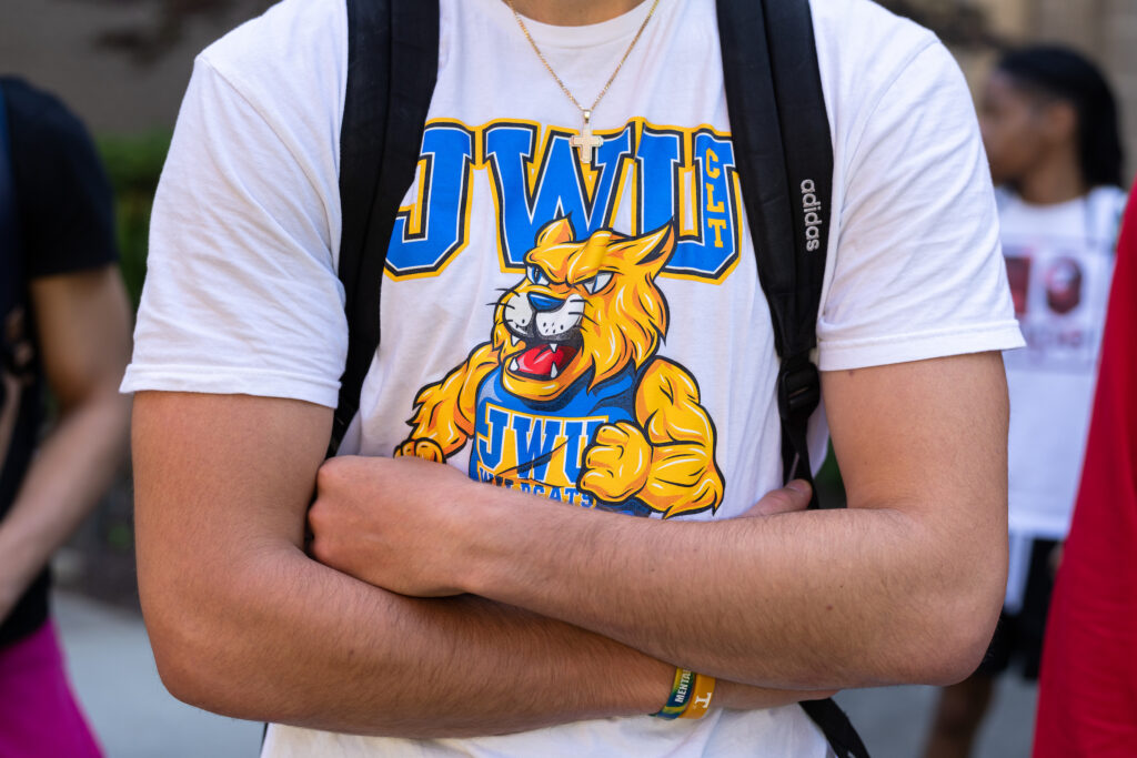 Student wearing a JWU-themed T shirt; close up