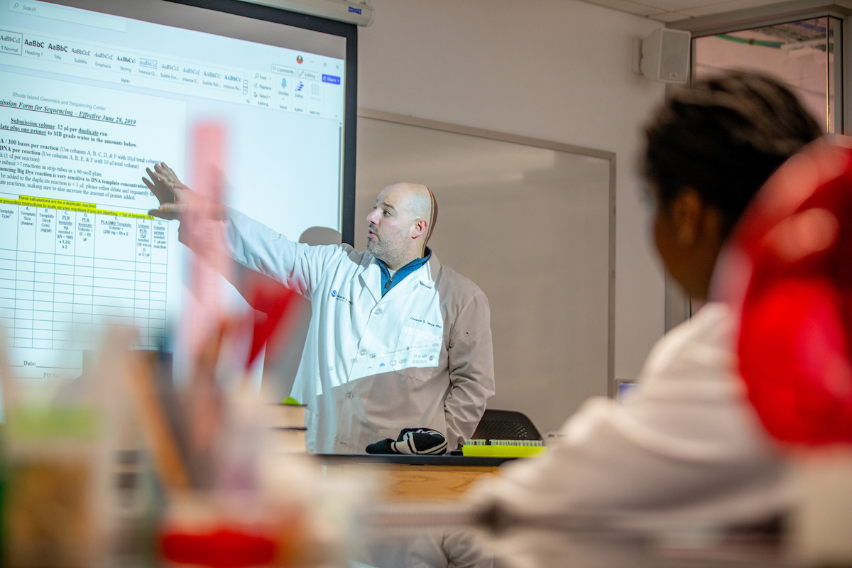 Professor in biology lab during class