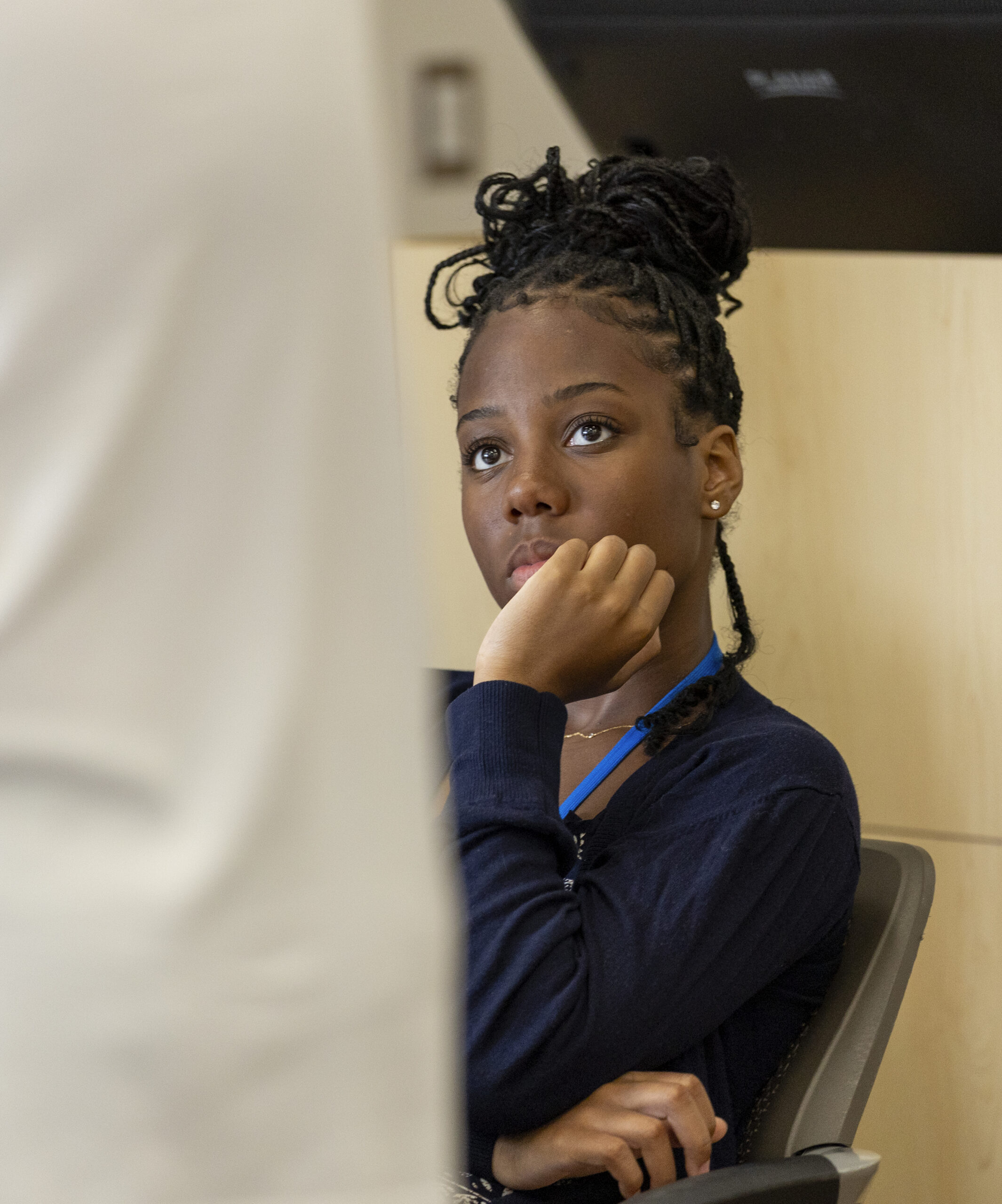 Student listening to speaker